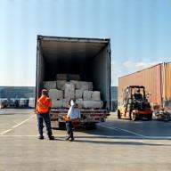 Textile goods being loaded for global transport